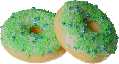 Leckerer Donut mit wunderschöner grüner Streudekoration und glänzenden blauen Zuckerperlen