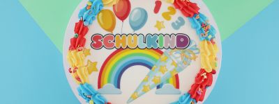 schulanganf banner Cake Company
